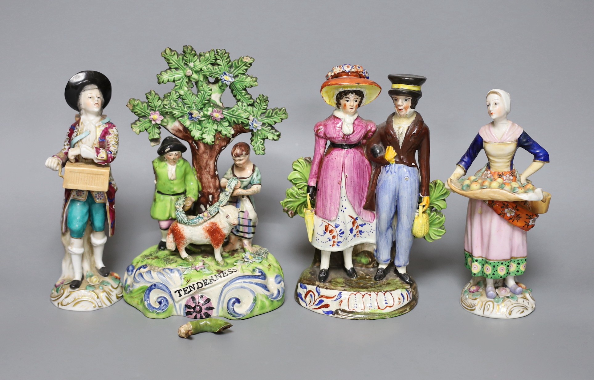 A Walton pearlware group ‘Tenderness’, a Walton type pearlware group of a couple, c.1820, and two Continental porcelain figures, tallest 18.5cm